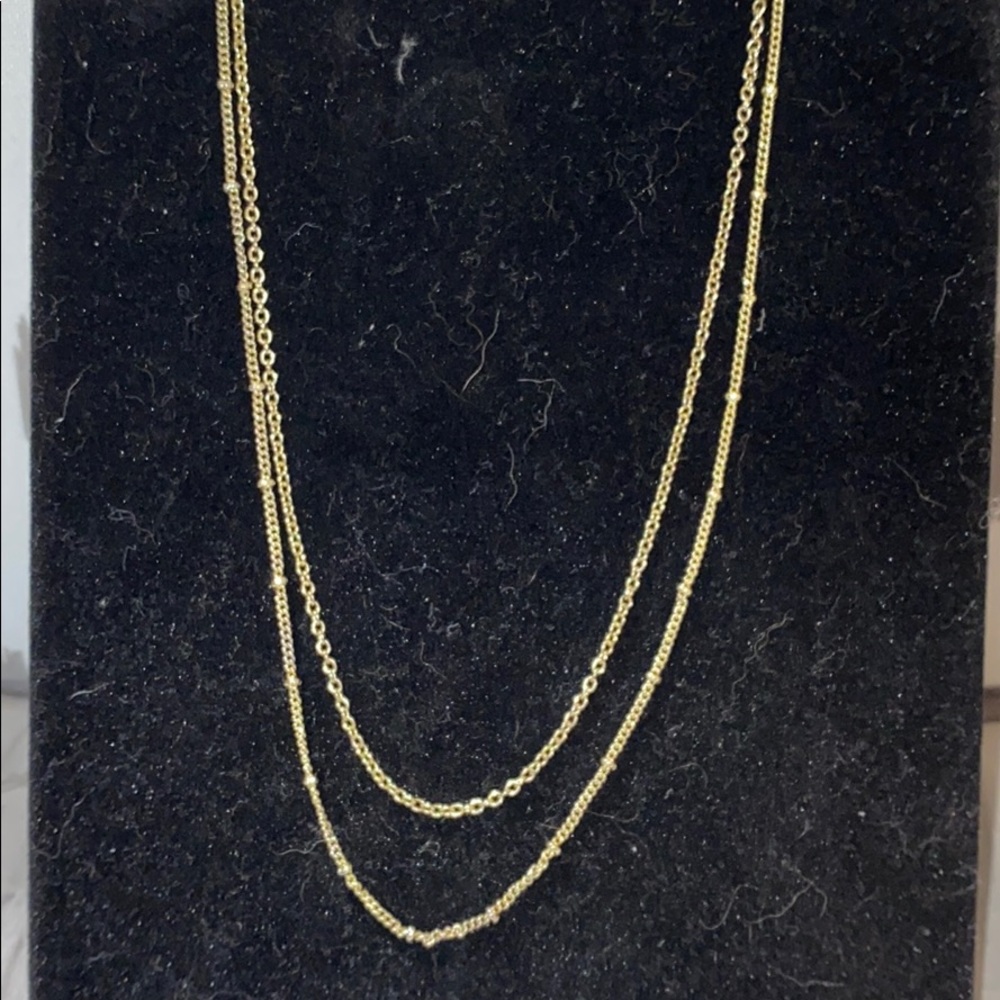 Gold tone choker necklace